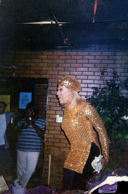 A feminine performer entertains at Soakie's.