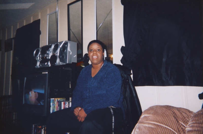 Starla Carr sits in a chair at her home.